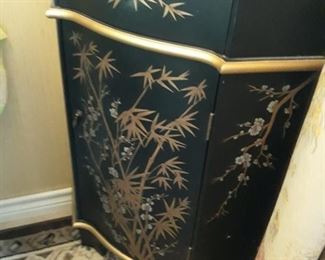 Oriental corner cabinet.