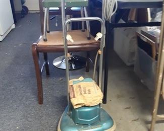 Vintage and still working floor polisher.