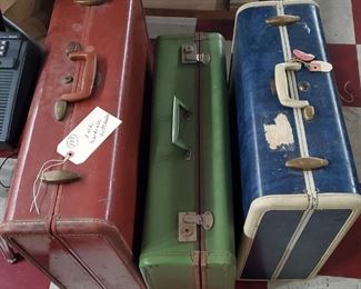 old suitcases, 2 are Samsonite