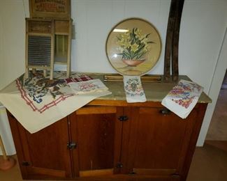 Vintage cabinet, washboard,  linens, 