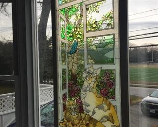 Beautiful Stained Glass Window with cats.