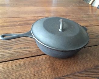 Cast iron covered pot.
