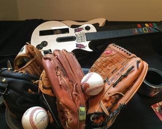 Baseball gloves and balls - and Guitar Hero.