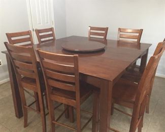 Nice Kitchen table with eight chairs.