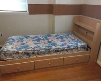 Platform bed with drawers.