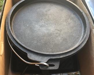 Cast iron cooking pot.