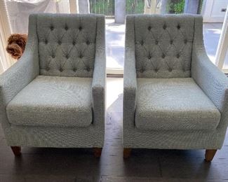 Paif of custom tufted back chairs in a neutral fabric 27.5"w x 32.5"d x 36"h. $540 