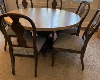 Ethan Allen 60" dining table and 6 chairs.  $560 not on site