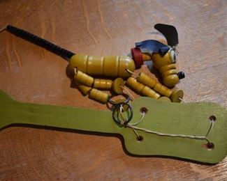 DSC 1513  Scarce Vintage 1930's   Fisher Price Toys Pop-Up Kritter Made in U.S.A., Mickey Mouse Pal Pluto with patent information, etc. The paddle measures 11" long and Pluto measures 5" high.