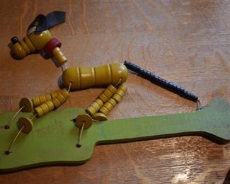 DSC 1512 Scarce Vintage 1930's   Fisher Price Toys Pop-Up Kritter Made in U.S.A., Mickey Mouse Pal Pluto with patent information, etc. The paddle measures 11" long and Pluto measures 5" high.