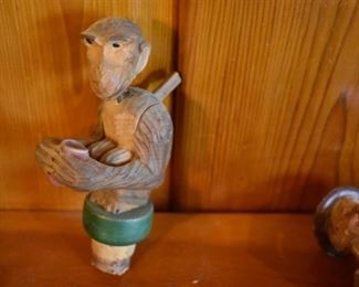 DSC 1516Vintage ANRI style Mechanical Wooden  Bottle Stopper each Stopper operates similar to a nutcracker, this one drinks from a cup. These are very difficult to find