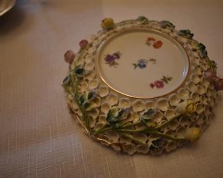This has got to be very rare. It looks like a "Tea Cup Rose Parade Float!" Delicate Flowers surround the signed Base and the lidded Cup adorned also with Roses and Birds! Gorgeous! I could not find a chip anywhere! The signing is extremely old!