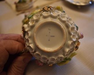 This has got to be very rare. It looks like a "Tea Cup Rose Parade Float!" Delicate Flowers surround the signed Base and the lidded Cup adorned also with Roses and Birds! Gorgeous! I could not find a chip anywhere! The signing is extremely old!