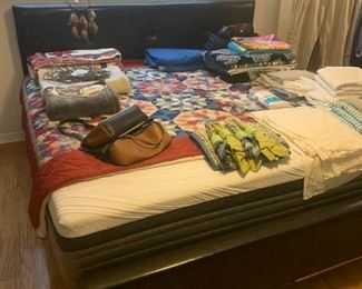 Fella's are you tired of those floral carved, painted white, super girly beds your wives made you buy because they were "pretty" and "stylish".  Well this one's for you.  Put your foot down and ask - no - TELL her that you're buying this manly bed made with the skin of dead animals* and it'll look great in your new apartment.  Plus tons of room for you to sleep sprawled out on all alone.   *No animals were harmed in the making of this bed, that's fake leather.