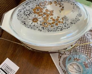 This is one of my favorite Pyrex patterns, cause from the front it's a very unassuming  pale peach-ish color but then you see the lid and bam, it's a frenetic trippy flower scene straight out of adult coloring books and someone was like "no one go anywhere by coloring inside the lines" and that's what started the Hippie Movement.  Also it's called Floral Bubbles and  that's just fun to say.