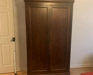 Fair warning, I'm not sure any of us has actually opened this wardrobe, so it could have tons of storage, or it could lead to Narnia.  Either way win/win.
