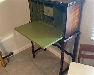 And here's our final Secretary in the "Secretaries  through the ages" tour, this one is really old, from the early 1900's.  I stupidly didn't take a picture of the front, but it's got a really cute hand painted decal.  But this green is super original to the piece too, so when people complain about us painting all this furniture, remember we weren't the first people who started that trend.