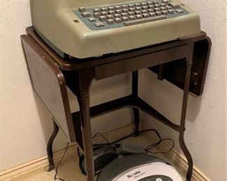 VINTAGE ELECTRIC IBM TYPEWRITER WITH STAND AND iROBOT ROOMBA  VACUUM 