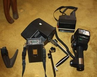 Polaroid Camera $ 25, Slide veiwer $25, camera light $25, Battery charger $45