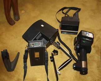 Polaroid Camera $ 25, Slide veiwer $25, camera light $95, Battery charger $45