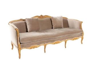 French Louis XV settee, four seat, carved wooden frame with grey cushions, rising on cabriole legs.
36 x 87 x 39"