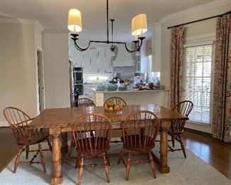 Outrageous Interiors dining table and Nichols + Stone vintage Windsor chairs