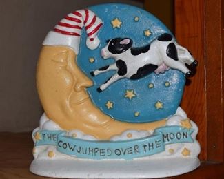 Cast Iron bookend / doorstop "The Cow Jumped Over the Moon"