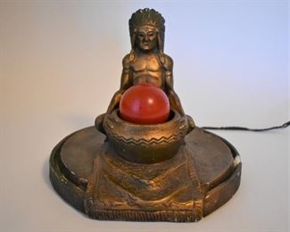 Vintage Native American Light; Red light bulb and Ceramic base.  The electrical cord requires repair.