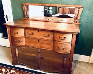 Oak Dresser and mirror. 
49.5w 49.5t 24d 
$300