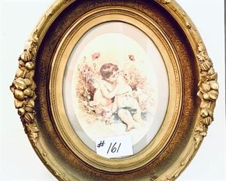 Antique frame with cherub print
 19 W 22T $125