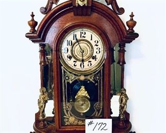 MANTLE CLOCK WITH CHERUBS 
working but no key
16w 24t.    $300