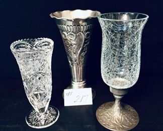Vases 
A- pressed glass 9”t  $15
B- metal  11”t.  $15
C- metal and crackle glass. 11t.  $15
