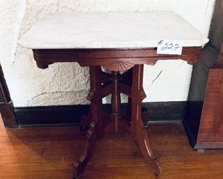 Antique marble top table on casters 
28W 30 T 20 D
$300