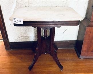 Stained marble top table
some veneer missing 28W 30 T 20 D 
$150