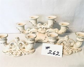 Set of three vintage candleholders 
7 to 11 inches long $30