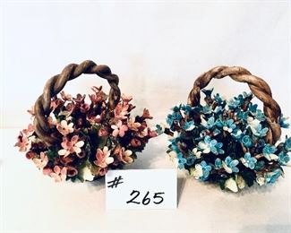 Pair of vintage ceramic flower baskets damage to some of the flowers
 7 inches wide 6.5 inches tall $25