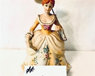 Lady figurine with parasol 8 inches tall $18