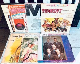 Set of seven vintage albums $18