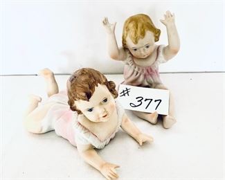 Set of two baby figurines
 8.5 wide 6 inch tall $35