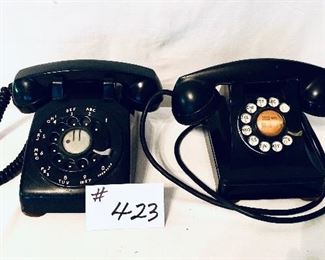 Two black rotary phones 
A-12
B- 18