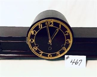 Art deco style clock 
no key hard to latch the back no glass face 20 wide 8.5 inches tall $30