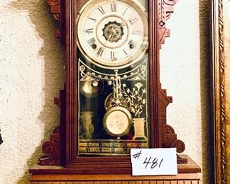 Walnut kitchen clock with alarm 
15 wide 18.5 tall $160