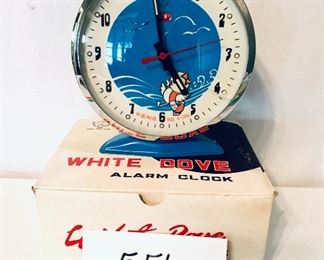 White dove alarm clock 5 inches tall cracked glass 
it works $15