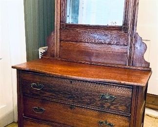 Antique dresser with mirror middle drawer is damaged see photo 
Mirror  is cloudy 39 Wide 72 tall 17 deep $400