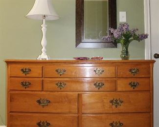 Willett furniture solid maple handcrafted dresser with mirror. Dresser (56" W x 21" D x 35" H)
Mirror (46"W x 34"H)