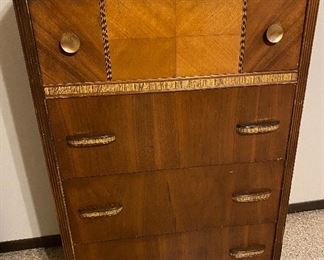 Waterfall chest of drawers w/inlaid wood