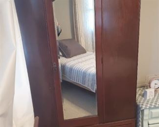 Beautiful Armoir with Hanging Bars and Bottom Drawer
