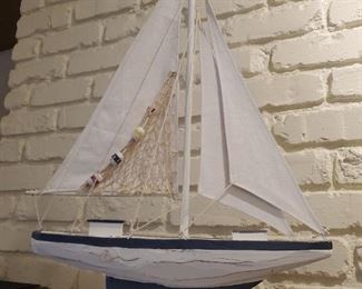 Wood and sail cloth sailboat decor