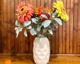 Cute white vase white colorful flowers