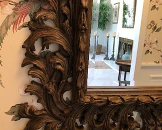 detail of carved resin mirror